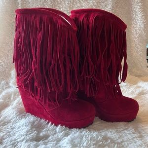 NWOT. Super fun and comfortable suede boots with fringe. SIZE 7-7.5.